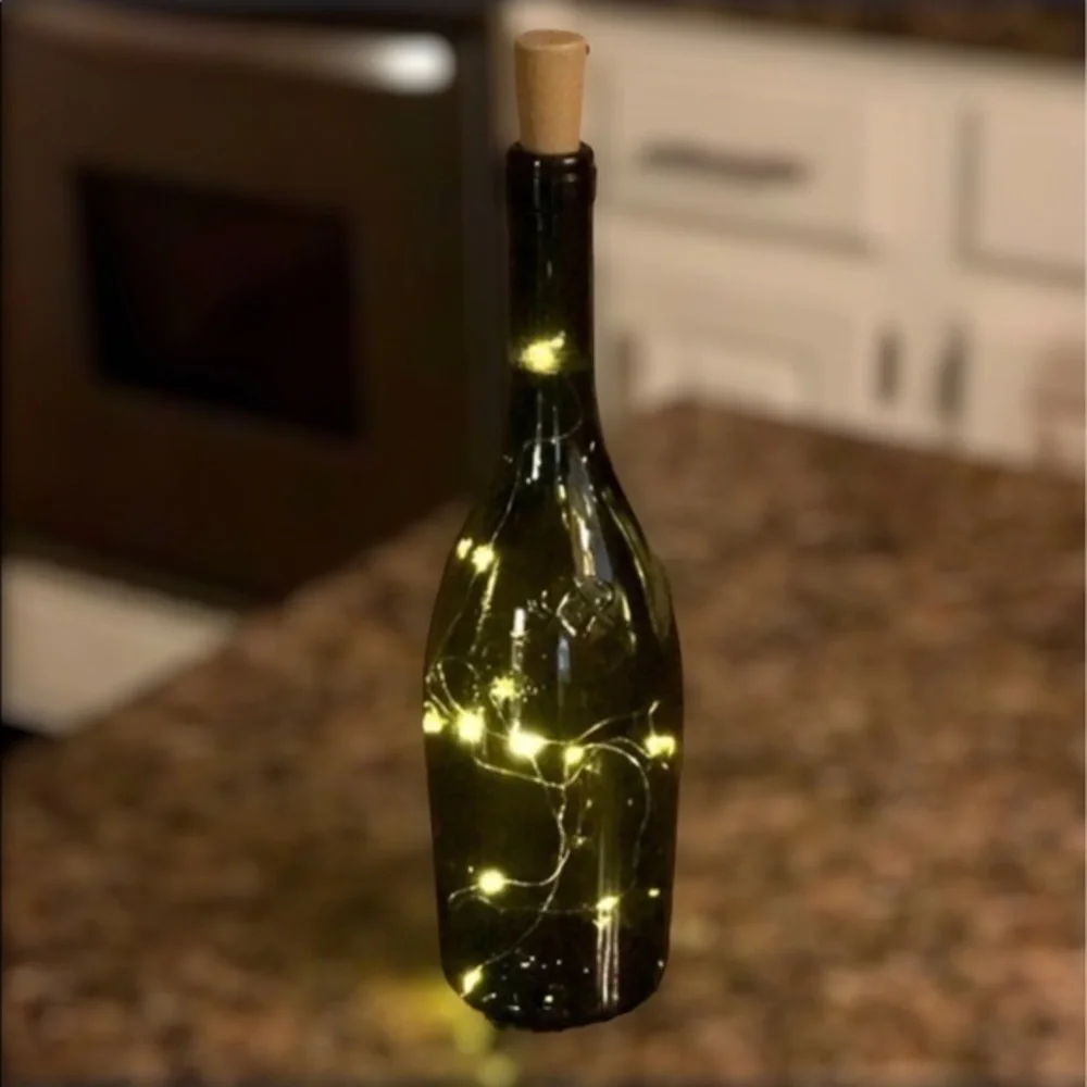 Fairy lights in wine bottle